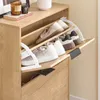 A wooden shoe cabinet with several compartments, some of which are open and display shoes. Podgląd zdjęcia produktu
