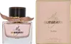 A perfume bottle and its packaging are displayed side-by-side against a white background. Anteprima dell’immagine prodotto