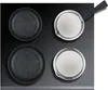 A top-down view of cookware on a black stovetop. Produktbild-Vorschau