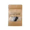 A brown paper pouch with a clear window showing screws and wall anchors inside. Podgląd zdjęcia produktu
