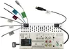 The back of a car stereo with various cables and connectors. Voir les images du produit