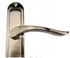 A close-up studio shot of a door handle. Produktbild-Vorschau