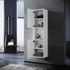 A modern bathroom with a fireplace and a white cabinet. Produktbild-Vorschau