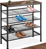 A multi-tiered shoe rack with a wooden top, displaying various types of shoes on its shelves. Náhled obrázku produktu