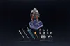 A collection of action figure accessories and a figure on a stand, laid out on a black background. Produktbild-Vorschau