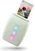 A mint green Instax mini Link 3 photo printer is shown at an angle, printing a photo of a woman holding a heart-shaped balloon. The printer has three illuminated lights in blue, pink, and purple. Náhľad obrázku produktu