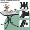 A square glass-top table with a black metal frame, set with two glasses of red wine, a vase of pink flowers, and pink macarons. Podgląd zdjęcia produktu