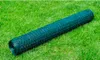 A roll of green wire mesh fencing lies on a green lawn. Náhľad obrázku produktu