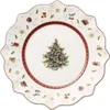 A Christmas-themed plate with a decorated Christmas tree in the center and small festive icons around the rim. Náhled obrázku produktu
