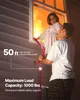 A man and a child are using a fire escape ladder to exit a burning building through a window. Produktbild-Vorschau