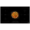 A black induction hob with a pot of food on it. Produktbild-Vorschau