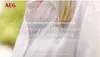 Close-up of a white shirt with text overlay advertising an AEG washing machine. Produktbild-Vorschau