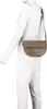 A mannequin wearing a taupe handbag. Produktbild-Vorschau