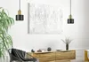 A modern living room with a pendant light, artwork, and furniture. Produktbild-Vorschau