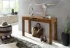 A console table with decorative items and accessories in a room setting. Produktbild-Vorschau