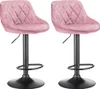 Two pink velvet bar stools with black bases and adjustable height. Voir les images du produit