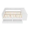 A white bed frame with wooden slats and two drawers underneath, shown from a slightly elevated front-left angle against a white background. Produktbild-Vorschau