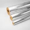 Three rolls of insulation material, wrapped in silver foil, are arranged diagonally on a white background. Produktbild-Vorschau