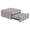 A light gray upholstered daybed or sofa bed is shown from a side-angle, partially extended. Podgląd zdjęcia produktu