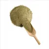 A wooden scoop is filled with a pile of green-brown powder, likely animal feed, against a white background. Produktbild-Vorschau