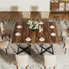 A dining room scene with a wooden table and chairs, set for a meal. Náhled obrázku produktu