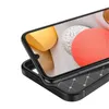 A close-up view of a black phone case with a geometric pattern on the back, showing the edge of a smartphone screen. Produktbild-Vorschau