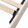 A close-up view of wooden slats and black fabric straps, likely part of a bed frame. Produktbild-Vorschau
