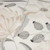A close-up view of a fabric with a floral pattern. Produktbild-Vorschau