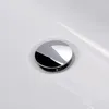 A close-up view of a chrome drain cover in a white bathtub. Produktbild-Vorschau