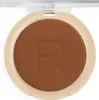 A close-up, top-down view of a bronzer compact. Anteprima dell’immagine prodotto