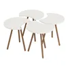 Four white, crescent-shaped side tables are arranged in a cluster on a white background. Náhled obrázku produktu