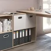 A corner of a desk with storage shelves and office supplies. Náhled obrázku produktu