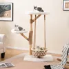 Three cats are relaxing on a multi-level cat tree with a hanging basket in a living room setting. Náhled obrázku produktu