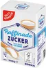 A bag of sugar with a wooden scoop and a small bowl of sugar. Produktbild-Vorschau