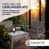 A patio set with chairs, a table, and wine glasses on a wooden deck during sunset. Produktbild-Vorschau