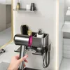 Šedý nástěnný držák na fén, který nevyžaduje vrtání a je Náhled obrázku produktu 5