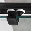 A close-up view of shower door rollers and a glass edge. Anteprima dell’immagine prodotto