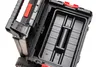 A close-up, angled view of an open black tool cart with red accents, showing its internal compartments. Anteprima dell’immagine prodotto