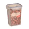 A clear plastic food storage container filled with coffee beans, with a label on the front. Produktbild-Vorschau