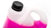 A close-up of a plastic jug with pink liquid and a black cap. Produktbild-Vorschau