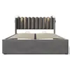 A studio shot of a bed frame with a tufted headboard and integrated reading lights. Produktbild-Vorschau