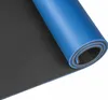 A rolled-up blue and black sleeping mat on a white background. Náhľad obrázku produktu