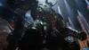 A giant, armored robot-like creature stands in a dimly lit, grand hall with spotlights. Produktbild-Vorschau