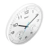 A white analog clock with integrated thermometer and hygrometer, shown from a slightly elevated angle against a white background. Voir les images du produit