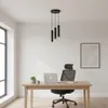 A modern office or study room with a desk, chair, and a pendant light fixture. Podgląd zdjęcia produktu
