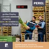 Two men in a warehouse setting, surrounded by crates of produce, are looking at a digital clock on the wall. One man is holding a bunch of leeks. Podgląd zdjęcia produktu