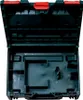 An empty black and red tool case with internal compartments. Produktbild-Vorschau