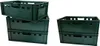 Stack of green plastic crates on a white background. Produktbild-Vorschau