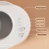 Close-up of the control panel of a small cleaning device, showing buttons and labels. Produktbild-Vorschau
