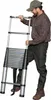 A man is holding and adjusting a telescopic ladder. Náhľad obrázku produktu